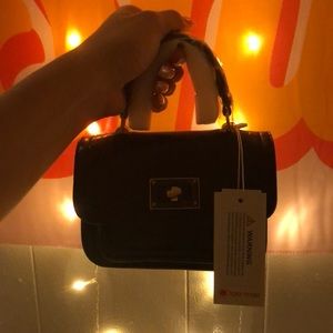 Lola Mae women’s mini bad PERFECT CONDITION!!